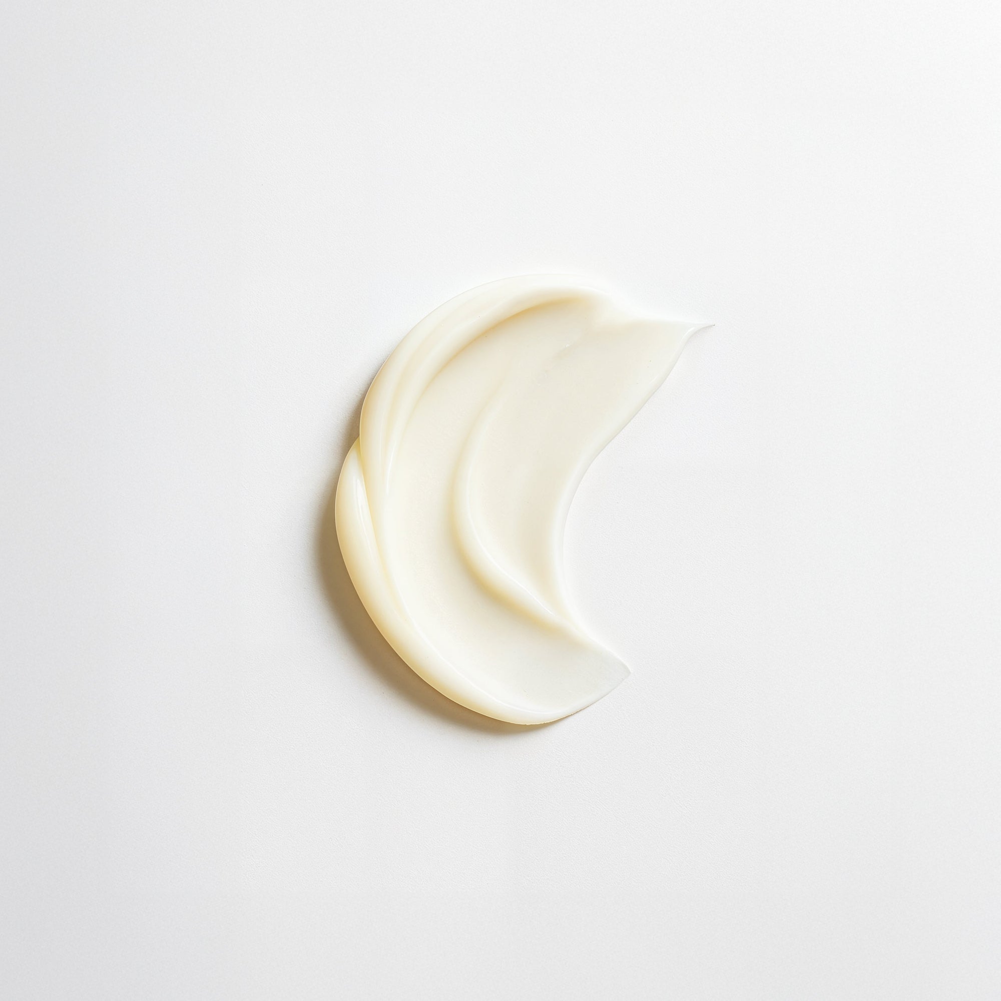 One swatch of cream on a light gray background